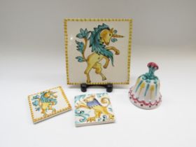 Three Italian pottery tiles, featuring unicorns & Lion, largest 20cm x 20cm, and an Italian