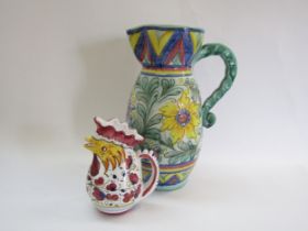 An Italian pottery Deruta jug painted with Cockerel design and a large Italian Pottery jug with