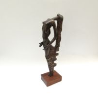 A late 20th Century bronze sculpture of a semi nude female, set on a wooden plinth base. Unmarked.