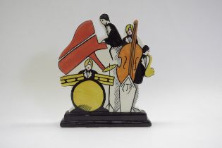 A Lorna Bailey Pottery limited edition flatback figural group 'Jazz Band'. Marks to verso, signed