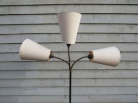A Danish standard lamp in black painted metal finish with three adjustable spot lights with