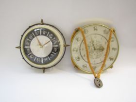 A Metamec "Zodiac" clock 28cm diameter and "Zodiac" Paico hanging wall clock made in Germany,