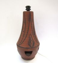 A Large earthenware double bulb floor lamp with incised line detail. 58cm high incl fitting