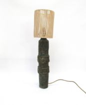 A studio pottery lamp base with green glaze. Indistinctly signed to base and dated 1966. 60cm high