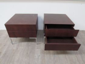 Antonio Citterio for B&B Italia - a pair of dark wood bedside chests raised on short square
