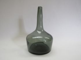 A Scandinavian mid 20th Century smoked glass 'mallet' form bottle vase. 23cm high