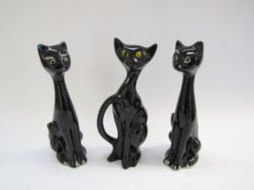 Three black glazed ceramic cats, two in style of Schmider 1950's, tallest 22.5cm