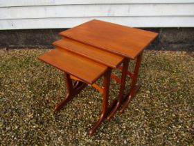 Victor Wilkins for G-Plan - a nest of three teak 'Fresco' range tables. Label to base. Largest