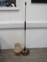 A teak and brass standard lamp and a teak and brass table lamp (2)