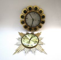 A Metamec sun burst wall clock, 48cm diameter and a Metamec Zodiac wall clock, 34cm diameter (2)