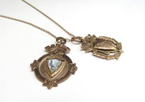 Two 9ct gold Alberts on engraved with a Pigeon the other with an enamel Pigeon presented to