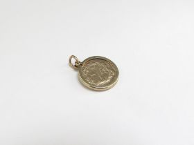 An 1862 gold $1 coin in 9ct gold pendant mount, 2.5g