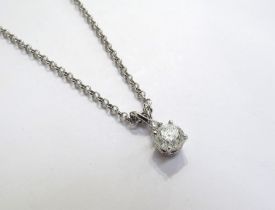 A two stone diamond drop pendant, one round brilliant cut stone 1.08ct approx in four claws with 0.