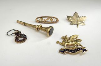 A gold leaf brooch, 10k, "The Buffs" regimental brooch (no pin) gold "Baby" brooch 9ct, a single