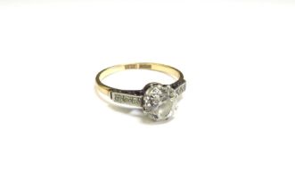 A diamond solitaire 1.25ct approx flanked by three 0.01ct diamonds to shoulders, 18ct/Plat. Size