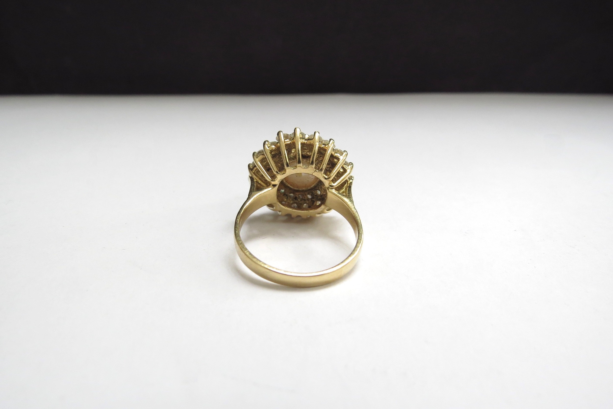 An 18ct gold pearl and diamond ring, the centre pearl 9mm framed by two rows of brilliant cut - Image 3 of 3