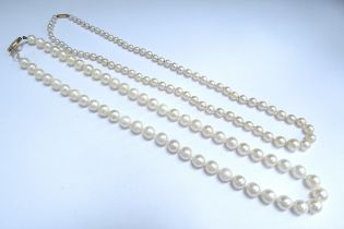 Two single strand pearl necklaces, 44cm long with 9c clasp and 46cm long