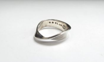 A Georg Jensen silver Mobius ring designed by Torun Bulow-Hube, #148. Size M, 3.9g, boxed