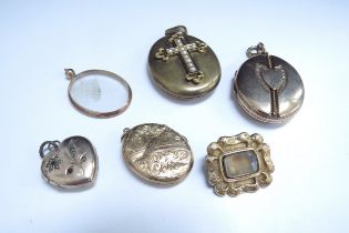 A Victorian locket with shield shaped cartouche. A Victorian locket with