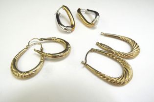 Three pairs of 9ct gold hoop earrings including two tone examples, 5.5g