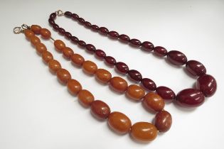 A cherry amber/Bakelite bead necklace, 46cm long 42.2g and an amber bead necklace, 39cm long, 42.