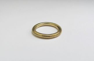 An 18ct gold ring with textured surface. Size I, 3.8g