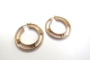 A pair of Tiffany and Co rose gold Atlas hoop earrings, stamped 750, 3cm diameter, 15.7g