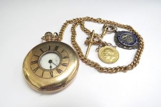 An 18ct gold watch chain with T-bar, two replaced links 9ct gold 40cm long, hung with a 1915 gold s