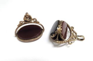 Two 9ct gold swivel fobs, including cornelian and onyx, 14.2g