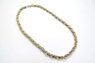 A Tiffany and Co gold necklace, circular links and triple bow links, stamped 585, 42cm long, 30g