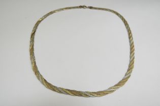 A 9ct gold two tone woven necklace, 39cm long, 11.3g