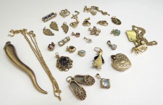 Various 9ct gold charms and pendants including unicorn, butterfly, penguin, two 9ct gold chains,