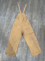 A WWII pair of Women's Land Army (W.L.A.) dungarees (overalls, bib & brace), size medium, dated 1944