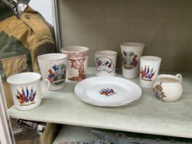 A collection of WWI and military related commemorative and patriotic ceramics including 'May they