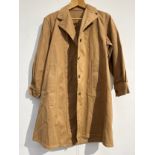 A WWII Women's Land Army (W.L.A.) coat (overalls coats drill), size large, dated 1944