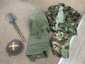 A British helmet dated 1949 (repurposed WWII Brodie) together with uniform including Nato camo and