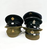 A quantity of peaked visor caps including WWI re-enactment peaked cap with Norfolk Regiment badge