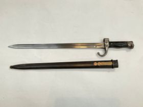 A French Model 1892 bayonet, first pattern, with second pattern muzzle ring, with scabbard