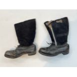 A pair of WWII British RAF flying boots “escape boots”, black leather and suede, the lower shoe