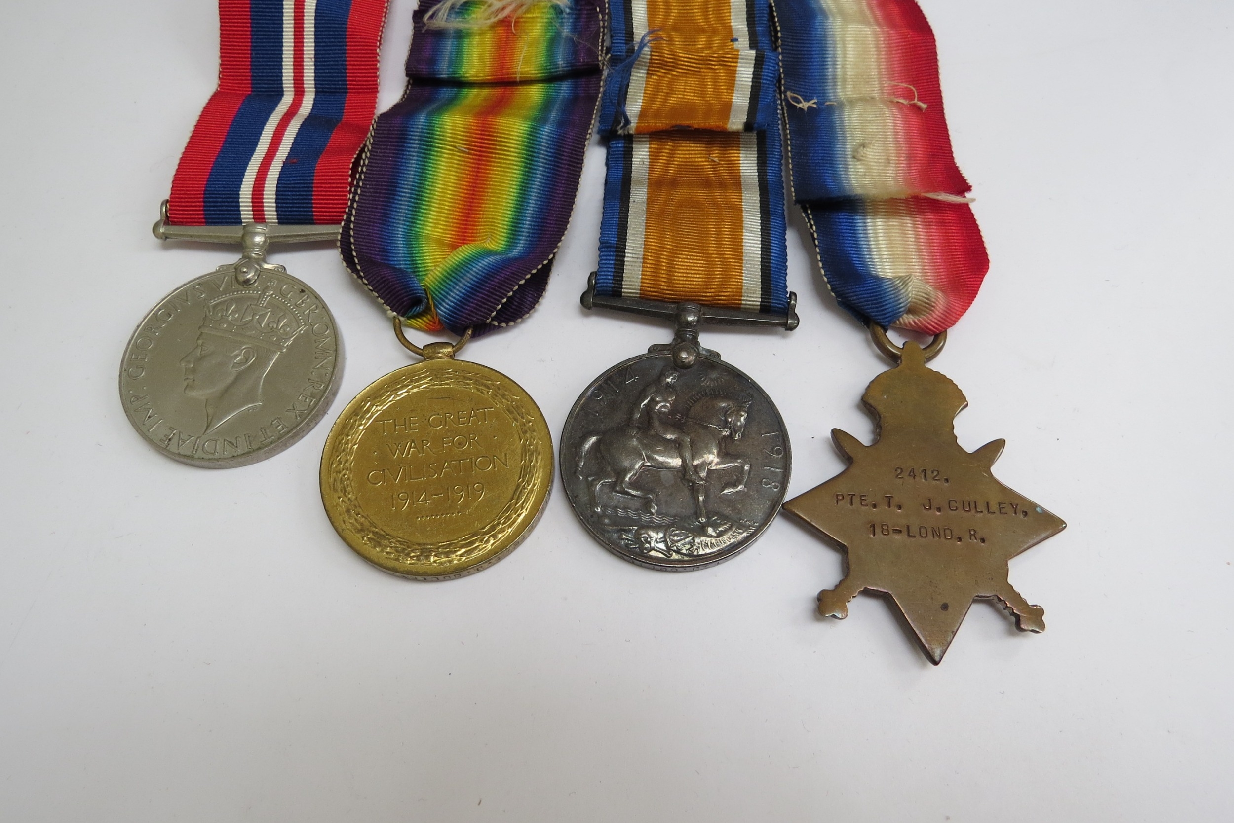 A WWI 1915 star medal trio named to 2412 PTE. T.J. CULLEY 18-LOND. R., together with a WWII War - Image 2 of 3