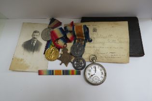 A WWI medal trio named to 42024 DVR. T. DREWITT R.E., together with war badge and accompanying card,