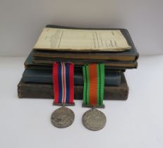 A pair of RAF medals together with three pre WWII log books, RAF pocket book etc, relating to C.G.