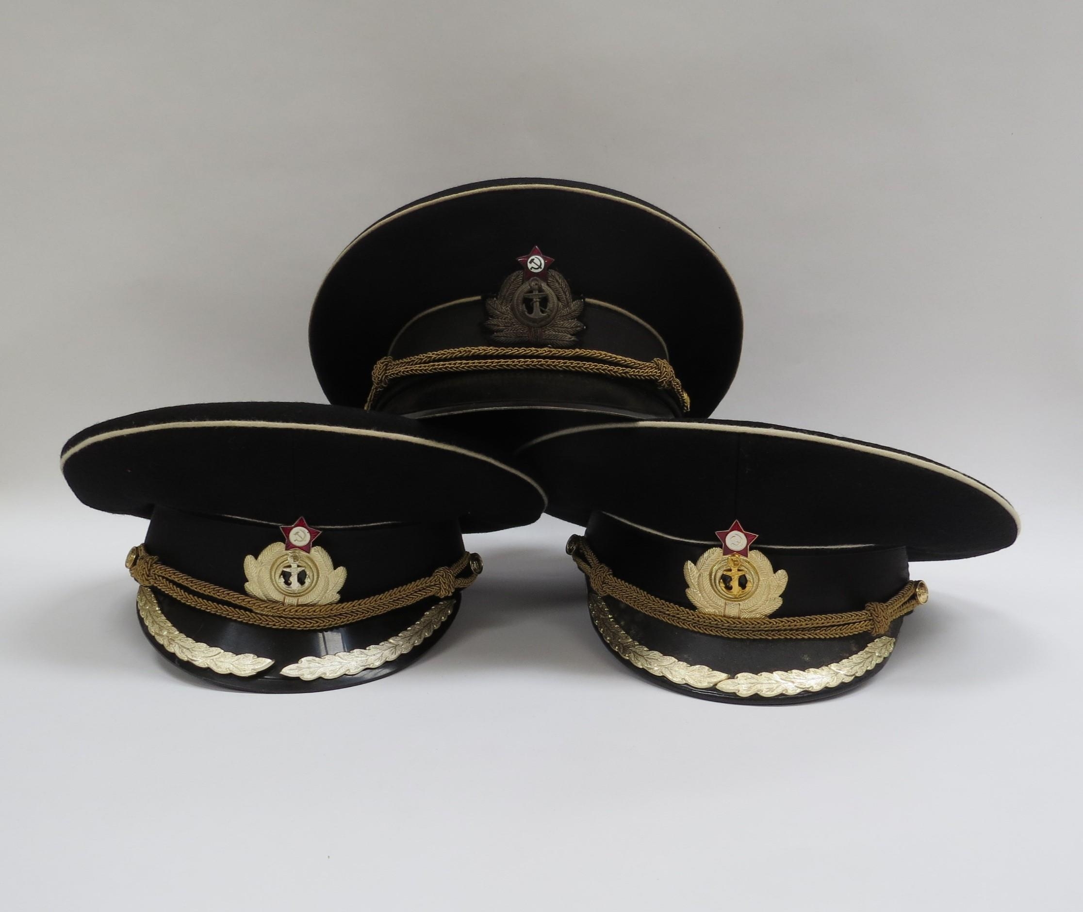 Three USSR Russian Soviet Naval officer's peaked visor caps, two high ranking with leaves to