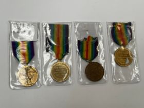 Four WWI Victory medals named to J.85075 J. JONES DRO. R.N., 242133 PTE. T.E. RODGERS E. LAN. R.,