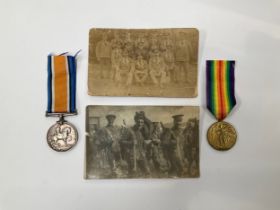 A WWI War Medal and Victory medal together with photos to 39493 DVR. J. THOMPSON RFA, missing 1914