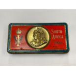 A Queen Victoria South Africa 1900 chocolate tin with original contents