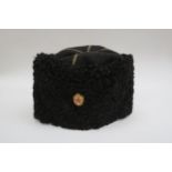 A USSR Russian Soviet Papakha astrakhan fur hat with black top, gold trim, bearing gilt and red