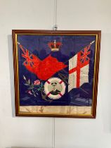 An early 20th Century silk embroidery, crossed white and red ensign flags with lifebelt with