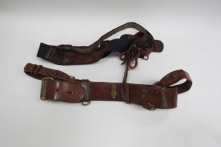 An Edwardian officer's sword belt with officer's Sam Browne belt with cross strap