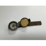 A WWII British wrist compass, stamped to rear 6B/2593, strap a/f